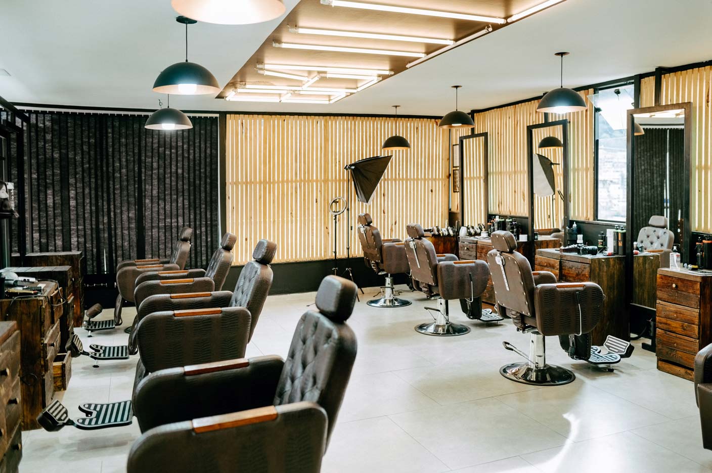 Stylish interior in empty modern and professional barbershop